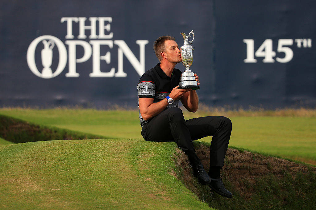 Henrik Stenson kisses the Claret Jug after winning The Open in 2016